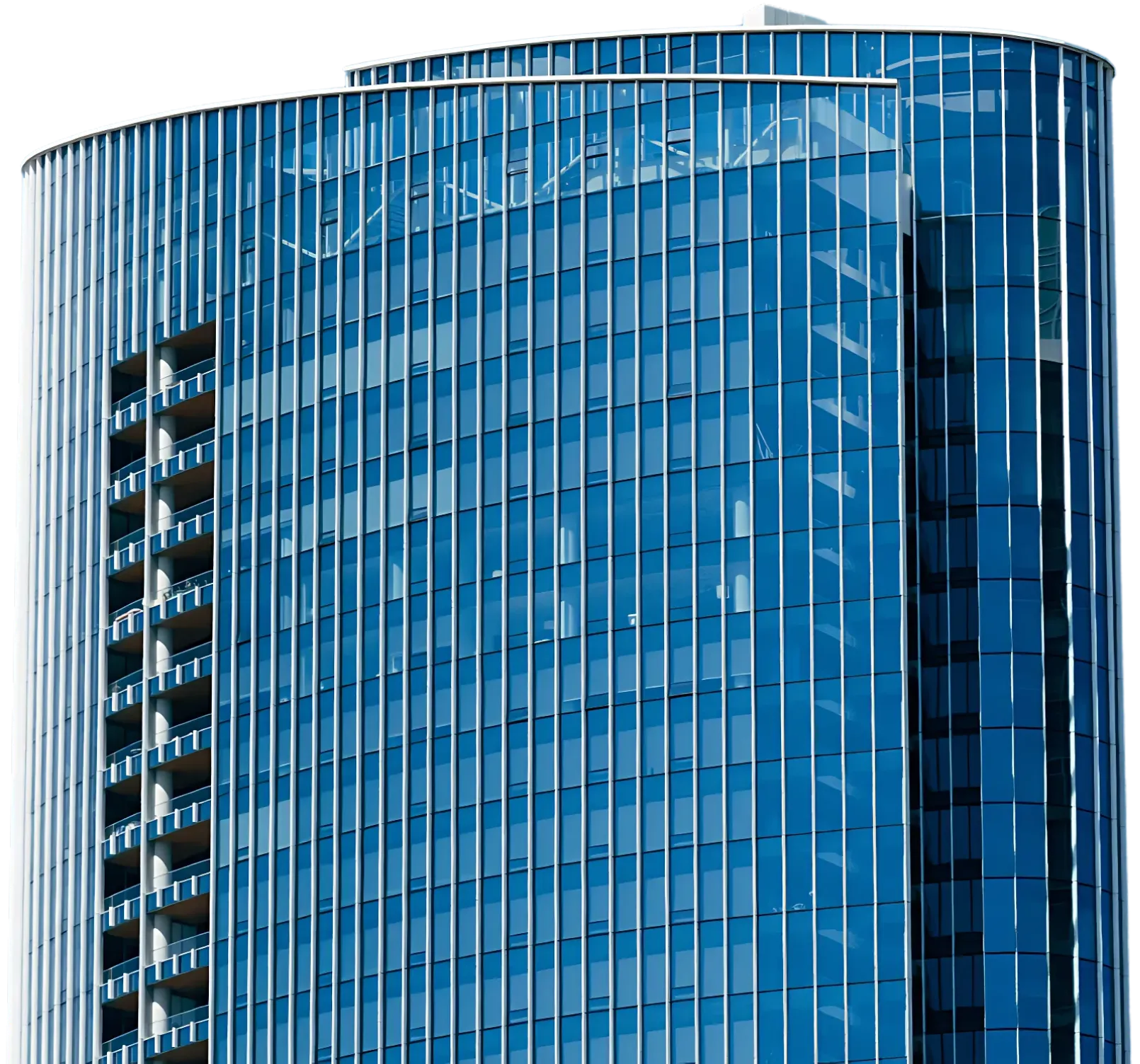 Sunlit interior atrium featuring terraced seating and timber finishes